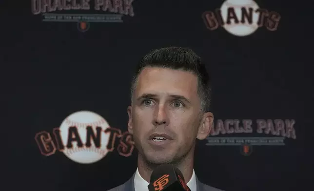 San Francisco Giants president of baseball operations Buster Posey speaks during a news conference in San Francisco, Tuesday, Oct. 1, 2024. (AP Photo/Jeff Chiu)