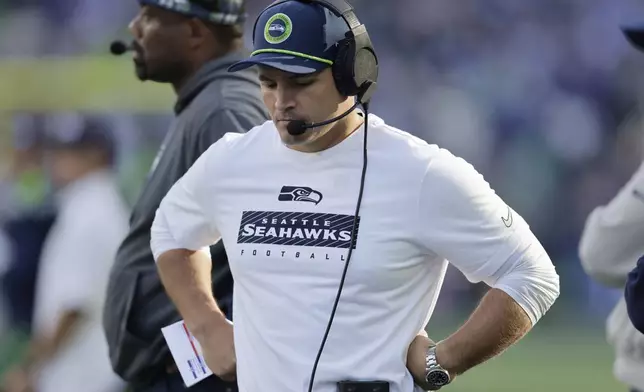 Seattle Seahawks head coach Mike Macdonald reacts during the second half of an NFL football game against the New York Giants, Sunday, Oct. 6, 2024, in Seattle. (AP Photo/John Froschauer)