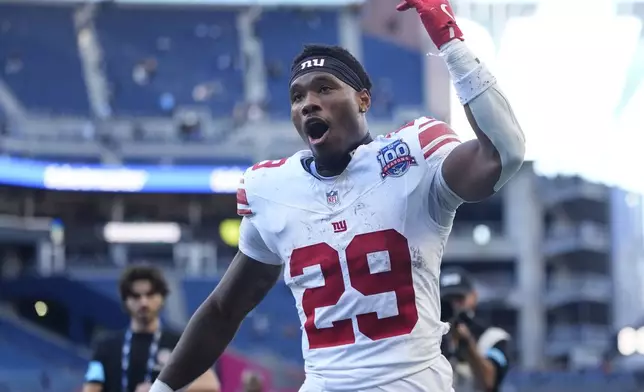 New York Giants running back Tyrone Tracy Jr. (29) celebrates after the 29-20 win against the Seattle Seahawks of an NFL football game, Sunday, Oct. 6, 2024, in Seattle. (AP Photo/Lindsey Wasson)