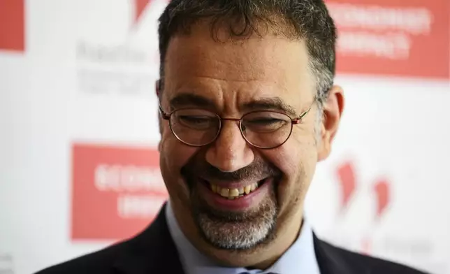 Economist Daron Acemoglu, 2024 Nobel prize winner in Economics, speaks to the media during a conference in Athens , Greece, Monday, Oct. 14, 2024. (AP Photo/Petros Giannakouris)