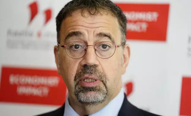 Economist Daron Acemoglu, 2024 Nobel prize winner in Economics, speaks to the media during a conference in Athens , Greece, Monday, Oct. 14, 2024. (AP Photo/Petros Giannakouris)