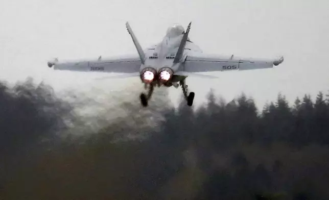 An EA-18G Growler takes off from Naval Air Station Whidbey Island during an exercise, March 10, 2016. (Ken Lambert/The Seattle Times via AP)