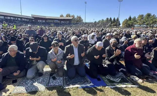 Thousands gather to morn the death of Fethullah Gülen, a Muslim cleric living in exile in the United States who faced unproven allegations that he orchestrated a failed 2016 coup in Turkey, in Skylands Stadium in Augusta, N.J., on Thursday, Oct. 24. 2024. (AP Photo/Mike Rubinkam)