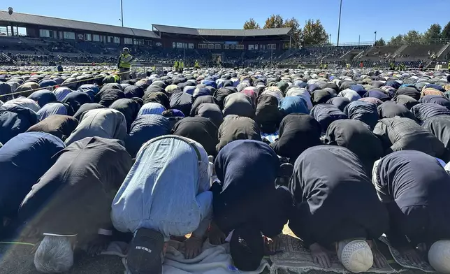 Thousands gather to morn the death of Fethullah Gülen, a Muslim cleric living in exile in the United States who faced unproven allegations that he orchestrated a failed 2016 coup in Turkey, in Skylands Stadium in Augusta, N.J., on Thursday, Oct. 24. 2024. (AP Photo/Mike Rubinkam)