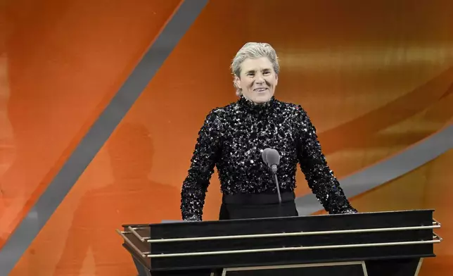 Michele Timms speaks during her enshrinement at the Basketball Hall of Fame, Sunday Oct. 13, 2024, in Springfield, Mass. (AP Photo/Jessica Hill)