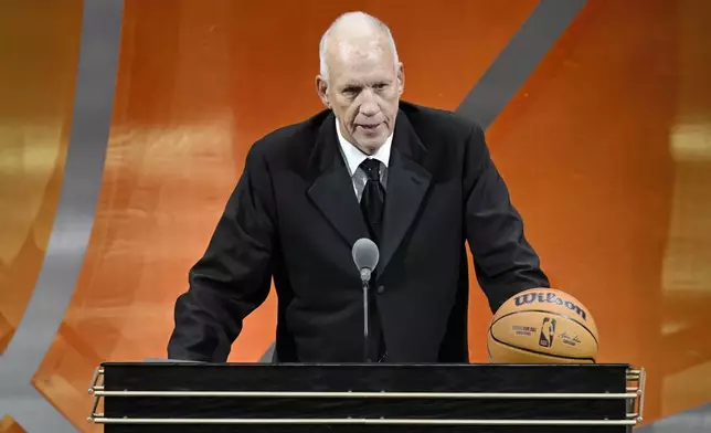 Doug Collins speaks during his enshrinement in the Basketball Hall of Fame, Sunday Oct. 13, 2024, in Springfield, Mass. (AP Photo/Jessica Hill)