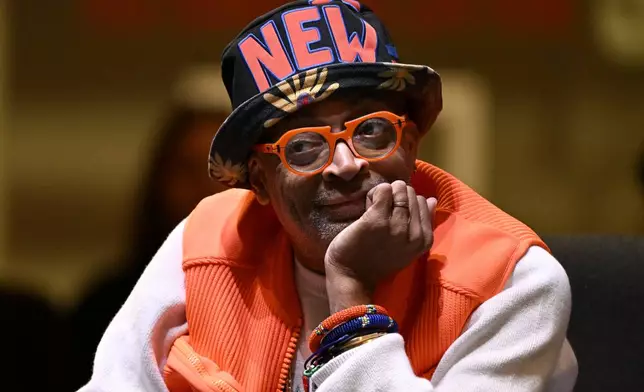 Film director Spike Lee is honored at a superfan ceremony at the Basketball Hall of Fame, Sunday, Oct. 13, 2024, in Springfield, Mass. Lee, actor Jack Nicholson, comedian Billy Crystal and businessman Alan Horwitz are being added to the Naismith Memorial Basketball Hall of Fame's James F. Goldstein SuperFan Gallery. (AP Photo/Jessica Hill)