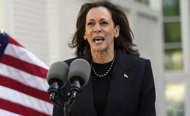 Democratic presidential nominee Vice President Kamala Harris speaks before planting a memorial tree on the grounds of the Vice President's residence in Washington on Monday, Oct. 7, 2024, to honor the victims and mark one year since the Oct. 7, 2023, Hamas attack on Israel. (AP Photo/Ben Curtis)