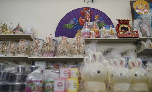 Cultural and religious items are sold at Top Asian Food and Deli in Worthington, Minn., on Saturday, Oct. 19, 2024. (AP Photo/Jessie Wardarski)