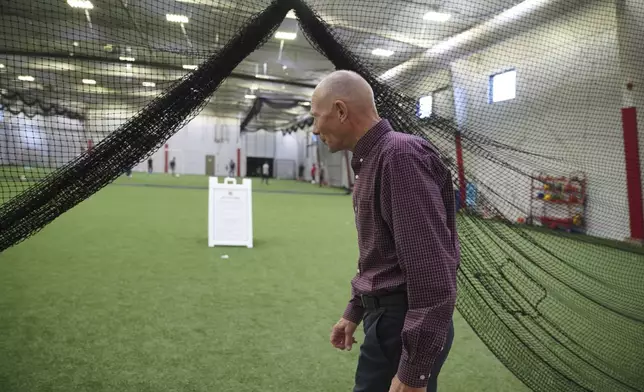 Steve Robinson, Worthington’s city administrator walks into the newly constructed JBS Fieldhouse on Monday, Oct. 21, 2024, in Worthington, Minn. (AP Photo/Jessie Wardarski)