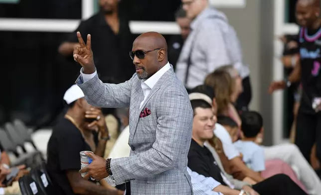 Former Miami Heat NBA basketball player Alonzo Mourning, cener, arrives at a statue unveiling ceremony for former teammate Dwyane Wade outside the Kaseya Center, Sunday, Oct. 27, 2024, in Miami, Fla. (AP Photo/Michael Laughlin)