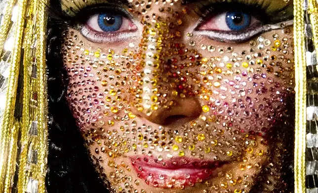 FILE - Heidi Klum shows off her jewel-encrusted face and Cleopatra costume during her Haunted Holiday Party benefiting Superstorm Sandy relief efforts, on Saturday, Dec. 1, 2012 in New York. (Photo by Charles Sykes/Invision/AP, File)