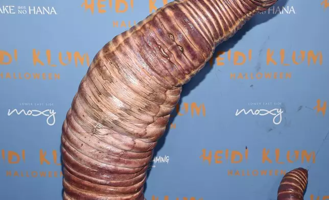 FILE - Heidi Klum, dressed as a worm, attends her 21st annual Halloween party on Oct. 31, 2022, in New York. (Photo by Evan Agostini/Invision/AP, File)