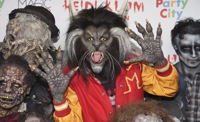 FILE - Heidi Klum, dressed as a werewolf from Michael Jackson's "Thriller" video, attends her 18th Annual Halloween Party at Moxy Times Square on Tuesday, Oct. 31, 2017, in New York. (Photo by Evan Agostini/Invision/AP, File)