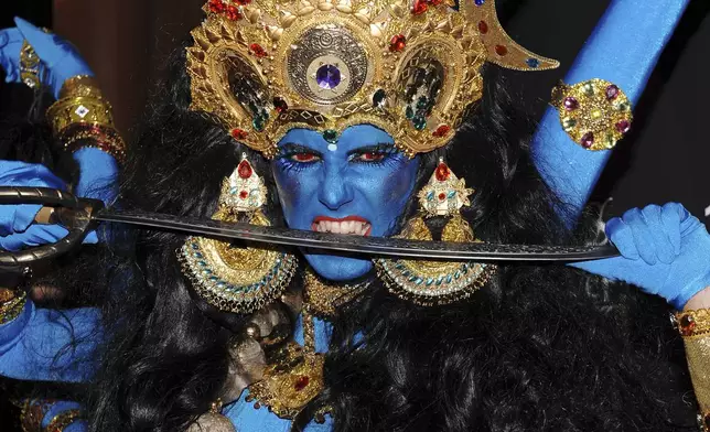FILE - Heidi Klum, dressed as Kali, the Hindu goddess of death and time, attends her annual Halloween party at 1Oak on Friday, Oct. 31, 2008 in New York. (AP Photo/Evan Agostini, File)