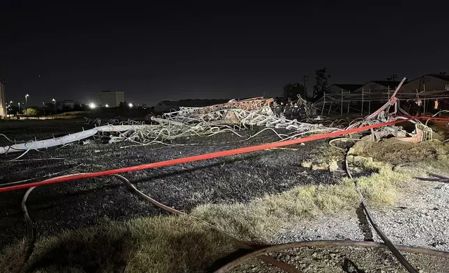 This image provided by the Houston Fire Department shows the scene of a helicopter crash in the city's Second Ward, Sunday, Oct. 20, 2024. (Houston Fire Department via AP)