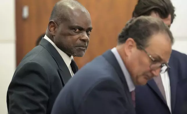 Former Houston police officer Gerald Goines is shown in the 482nd District Court at the Harris County Criminal courthouse as the jury enters the courtroom during the punishment phase of his felony murder trial Thursday, Oct. 3, 2024, in Houston. (Melissa Phillip/Houston Chronicle via AP)