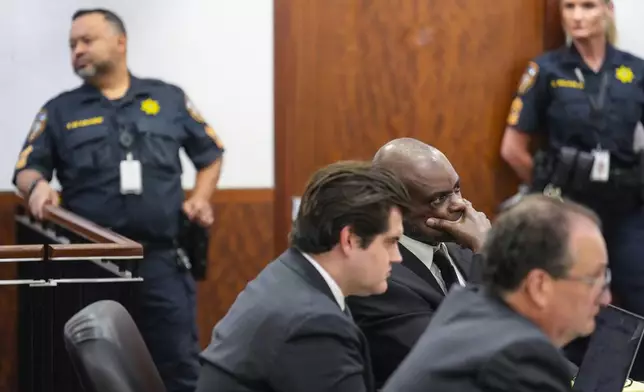 Former Houston Police officer Gerald Gaines listens to closing arguments in the punishment phase of his felony murder trial on Monday, Oct. 7, 2024 in Houston. Goines was found guilty of felony murder in the 2019 deaths of Dennis Tuttle and Rhogena Nicholas. (Brett Coomer/Houston Chronicle via AP)