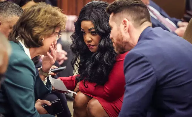 District Attorney Kim Ogg, left, talks to prosecutors Tanisha Manning, center, and Keaton Forcht after a 60-year prison sentence was handed down to former Houston police officer Gerald Gaines on a pair of felony murder convictions they litigated on Tuesday, Oct. 8, 2024, in Houston. Goines was found guilty of felony murder in the 2019 deaths of Dennis Tuttle and Rhogena Nicholas. (Brett Coomer/Houston Chronicle via AP)