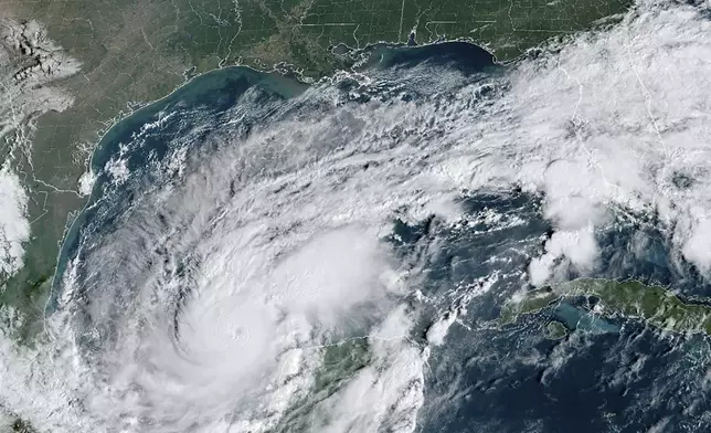 This satellite image provided by the National Oceanic and Atmospheric Administration on Monday, Oct. 7, 2024, shows Hurricane Milton. (NOAA via AP)