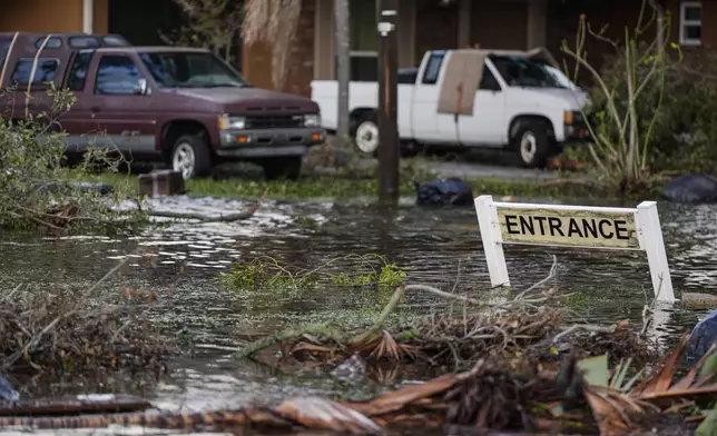 High water is seen on Hillsborough street in the aftermath of hurricane Milton, Thursday, Oct. 10, 2024, in Tampa, Fla. (AP Photo/Mike Stewart)