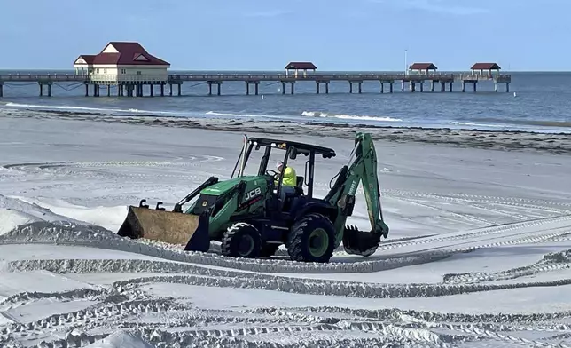 Clean up continues at Clearwater Beach, Fla., after Hurricane Milton on Friday, Oct. 11, 2024 in (AP Photo/Haven Daley)