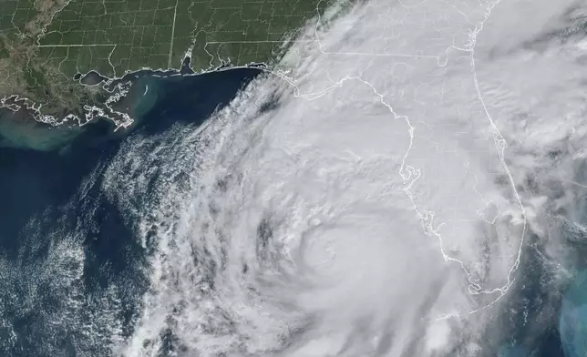 This GOES-16 GeoColor satellite image taken at 11:46 a.m. EDT and provided by National Oceanic and Atmospheric Administration (NOAA) shows Hurricane Milton in the Gulf of Mexico off the coast of Florida, Wednesday, Oct. 9, 2024. (NOAA via AP)