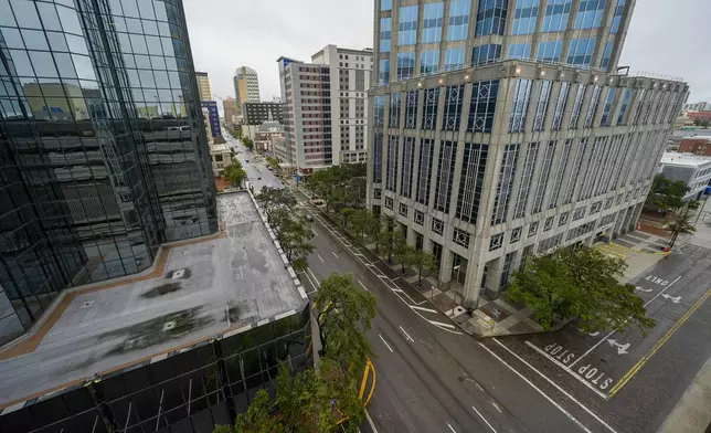 Downtown Tampa, Fla., is seen desolate ahead of the arrival of Hurricane Milton, Wednesday, Oct. 9, 2024. (AP Photo/Julio Cortez)