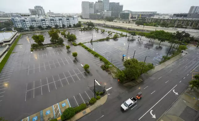 Downtown Tampa, Fla., is seen desolate ahead of the arrival of Hurricane Milton, Wednesday, Oct. 9, 2024. (AP Photo/Julio Cortez)