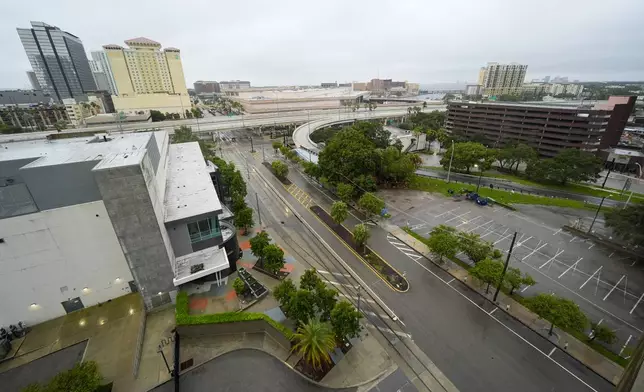 Downtown Tampa, Fla., is seen desolate ahead of the arrival of Hurricane Milton, Wednesday, Oct. 9, 2024. (AP Photo/Julio Cortez)