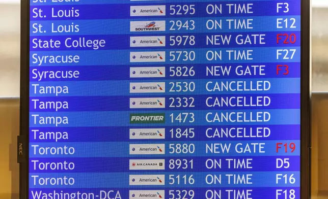 Flight information board with cancelled flights to Tampa is shown on Wednesday, Oct. 9, 2024 at the Philadelphia International Airport. (Alejandro A. Alvarez/The Philadelphia Inquirer via AP)