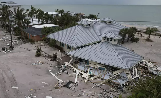 A destroyed building stands on Manasota Key, Fla., following the passage of Hurricane Milton, Friday, Oct. 11, 2024. (AP Photo/Rebecca Blackwell)