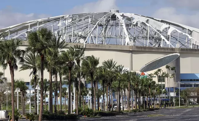 The roof of Tropicana Field was torn off during Hurricane Milton on Thursday, Oct. 10, 2024, in St. Petersburg, Fla. (AP Photo/Mike Carlson)