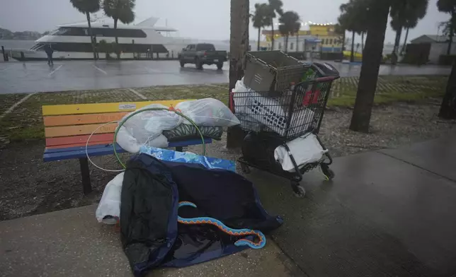 Personal items sit abandoned on the side of a road on Deadman Key, ahead of the arrival of Hurricane Milton, in South Pasadena, Fla., Wednesday, Oct. 9, 2024. (AP Photo/Rebecca Blackwell)