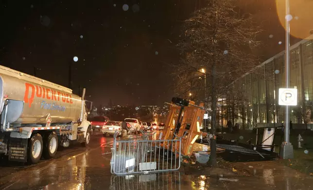 FILE - Barricades are overturned in front of the Georgia World Congress Center, next to the Georgia Dome in Atlanta, March 14, 2008. (AP Photo/Bill Haber, File)