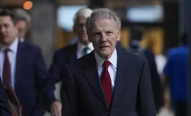 Former Illinois House Speaker Michael Madigan arrives at federal court where he is on trial for charges in a multimillion-dollar racketeering and bribery scheme Monday, Oct. 21, 2024, in Chicago. (AP Photo/Erin Hooley)