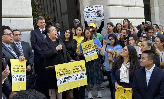 Nina Perales, vice president of litigation for the Mexican American Legal Defense and Educational Fund, speaks to DACA supporters after appearing in federal appeals court in New Orleans to defend the policy on Thursday, Oct. 10, 2024. (AP Photo/Jack Brook)