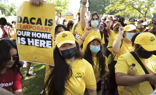 FILE - Susana Lujano, left, joins other activists to rally in support of the Deferred Action for Childhood Arrivals program, also known as DACA, at the Capitol in Washington, June 15, 2022. (AP Photo/J. Scott Applewhite, File)