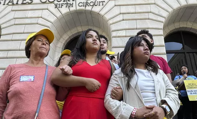 DACA supporters rally outside the 5th Circuit Court of Appeals in New Orleans on Thursday, Oct. 10, 2024, following a hearing on the future of the policy granting hundreds of thousands temporary legal status to stay in the U.S. (AP Photo/Jack Brook)