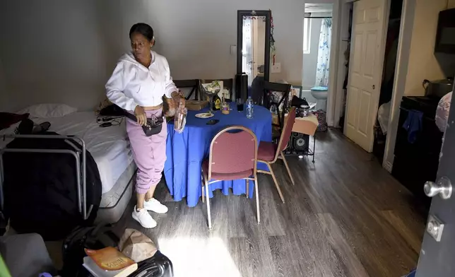 Sofia Roca packs up to leave Aurora, Colorado, on March 29, 2024. Her roommates were headed to eviction court the next week and she didn’t know where she would go if they lost the apartment. (AP Photo/Thomas Peipert)