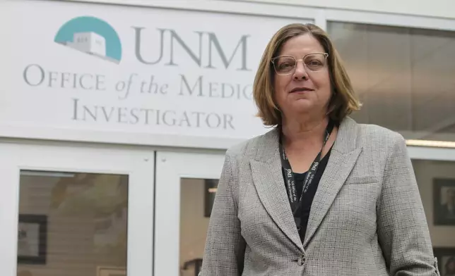 Forensic anthropologist Heather Edgar with the Office of the Medical Investigator poses for a portrait outside her office in Albuquerque, New Mexico, on Thursday, Oct. 3, 2024. (AP Photo/Susan Montoya Bryan)