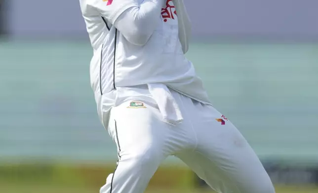 Bangladesh's Shakib Al Hasan takes the catch to get wicket of India's Yashasvi Jaiswal on the fifth and final day of the second cricket test match between Bangladesh and India in Kanpur, India, Tuesday, October 1, 2024. (AP Photo/Ajit Solanki)