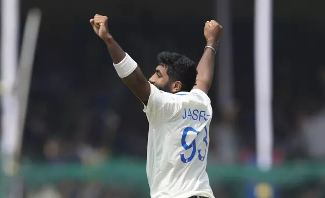 India's Jasprit Bumrah celebrates the wicket of Bangladesh's Mehidy Hasan Miraz on the fifth and final day of the second cricket test match between Bangladesh and India in Kanpur, India, Tuesday, October 1, 2024. (AP Photo/Ajit Solanki)