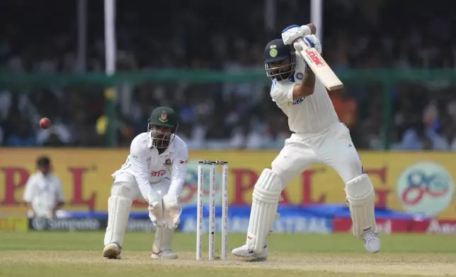 India's Virat Kohli plays a shot on the fifth and final day of the second cricket test match between Bangladesh and India in Kanpur, India, Tuesday, October 1, 2024. (AP Photo/Ajit Solanki)