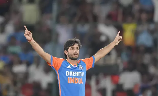 India's Ravi Bishnoi celebrates the wicket of Bangladesh's captain Najmul Hossain Shanto during the third and final T20 cricket match between Bangladesh and India in Hyderabad, India, Saturday, Oct. 12, 2024. (AP Photo/Mahesh Kumar A.)