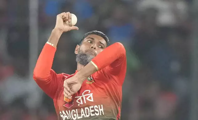 Bangladesh's Mohammad Mahmudullah bowls during the third and final T20 cricket match between Bangladesh and India in Hyderabad, India, Saturday, Oct. 12, 2024. (AP Photo/Mahesh Kumar A.)