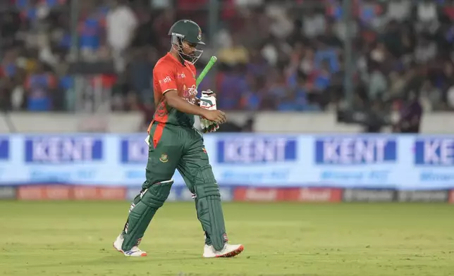 Bangladesh's captain Najmul Hossain Shanto walks back pavilion after losing his wicket to India's Ravi Bishnoi during the third and final T20 cricket match between Bangladesh and India in Hyderabad, India, Saturday, Oct. 12, 2024. (AP Photo/Mahesh Kumar A.)