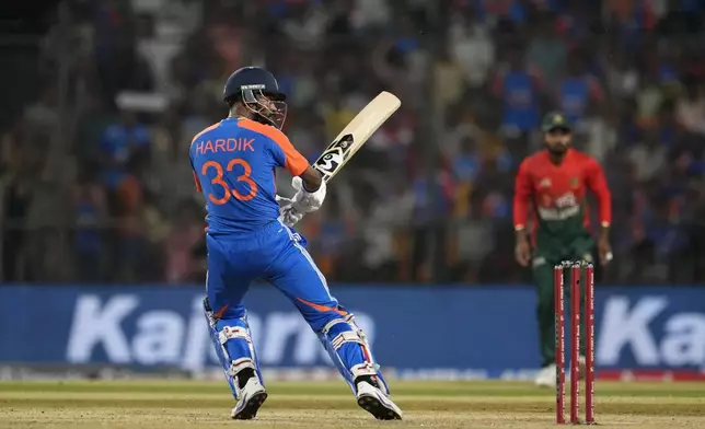 India's Hardik Pandya plays a shot during the first T20 cricket match between Bangladesh and India in Gwalior, India, Sunday, Oct. 6, 2024. (AP Photo/Manish Swarup)