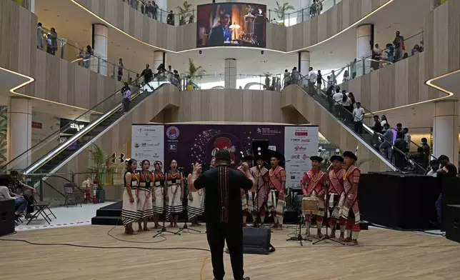 Artists from Indian's northeastern state of Nagaland perform at a shopping mall during the two-day Brillante Piano Festival in Bengaluru, India, Sunday, Sept. 29, 2024. (AP Photo/Aijaz Rahi)