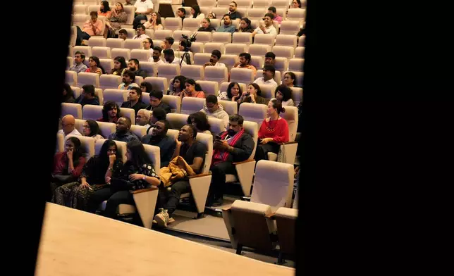 People take their seats to watch performances at the two-day Brillante Piano Festival in Bengaluru, India, Sunday, Sept. 29, 2024. (AP Photo/Aijaz Rahi)